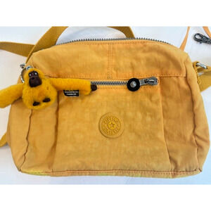 Kipling Wes Crossbody bag In Spicy Gold Warm Yellow Monkey Orangutan Keychain